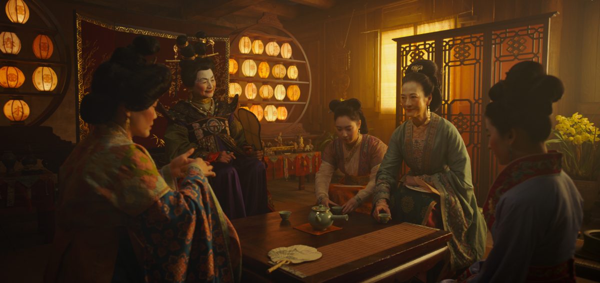 Disney's MULAN..L to R: Groom's mother, Matchmaker (Pei-Pei Cheng), Xiu (Xana Tang), Wuwei (Rosalind Chao) and Mulan (Yifei Liu)..Photo: Film Frame..© 2019 Disney Enterprises, Inc. All Rights Reserved.