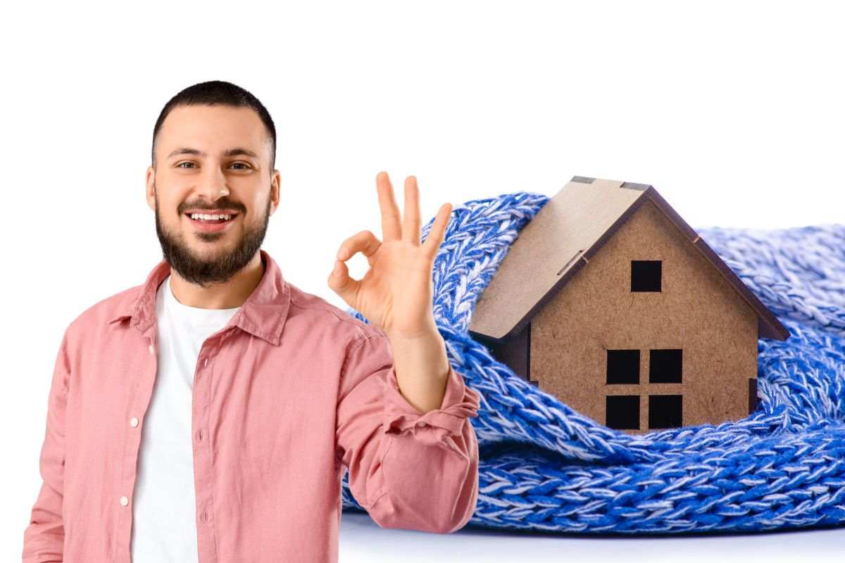 Uomo gesto ok riscaldamento casa